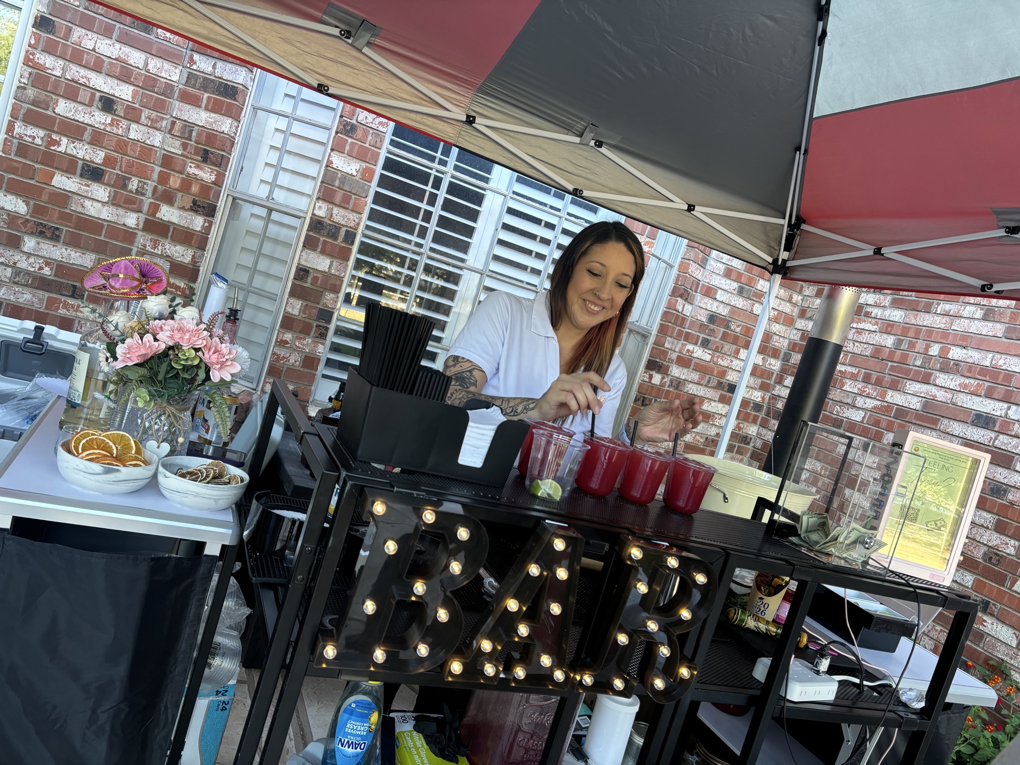 Bliss Mobile Bar bartender crafting cocktails at an event